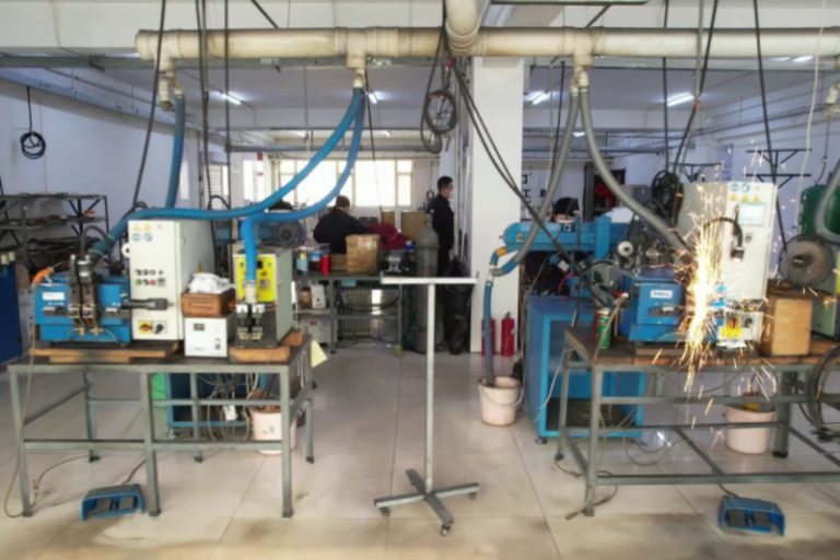 Professional band saw blade welding workshop in Shark-Tools manufacturing facility