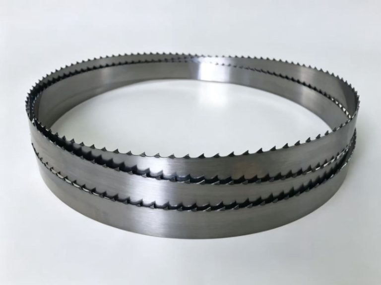 A coil of welded food cutting band saw blade ready for meat and bone processing