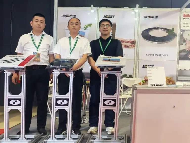 Shark Tools team members inside the exhibition booth display area
